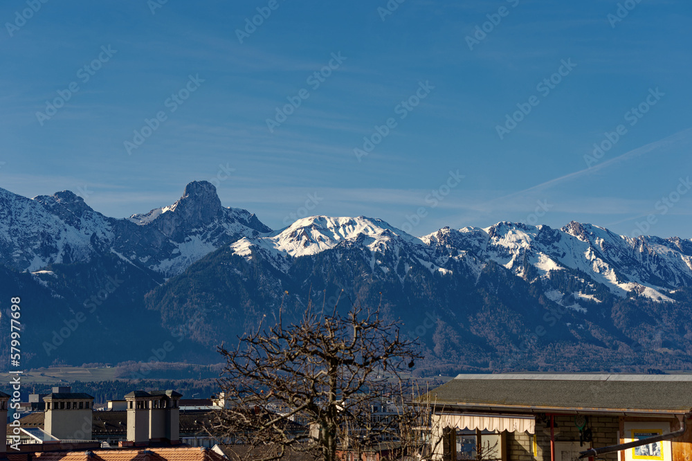 Scenic view over City of Thun with beautiful landscape and Swiss Alps in the background on a sunny winter day. Photo taken February 21st, 2023, Thun, Switzerland. Scenic view over City of Thun with beautiful landscape and Swiss Alps in the background on a sunny winter day. Photo taken February 21st, 2023, Thun, Switzerland.