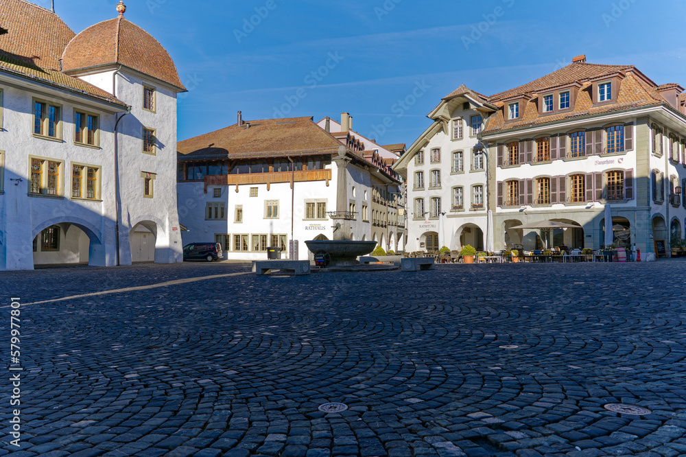 Old town of City of Thun with Town Hall Square on a sunny winter day. Photo taken February 21st, 2023, Thun, Switzerland.