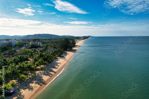 Fototapeta Naklejka Na Ścianę i Meble -  Paradise from Above: Stunning Aerial View of the Coastline from Vietnam with a calm sea without waves and beautiful soft sand