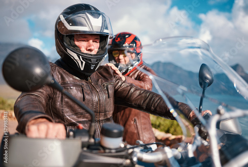 Travel, motorbike and senior couple on vacation, retirement and quality time outdoor. Love, mature man and old woman on motorcycle, road trip and summer holiday for break, bonding and loving together © Courtney H/peopleimages.com