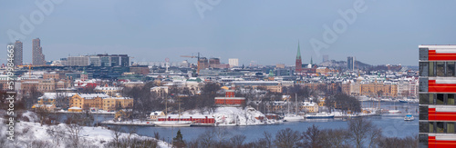 Harbor view, down town skyline, piers and bays, a snowy day in Stockholm