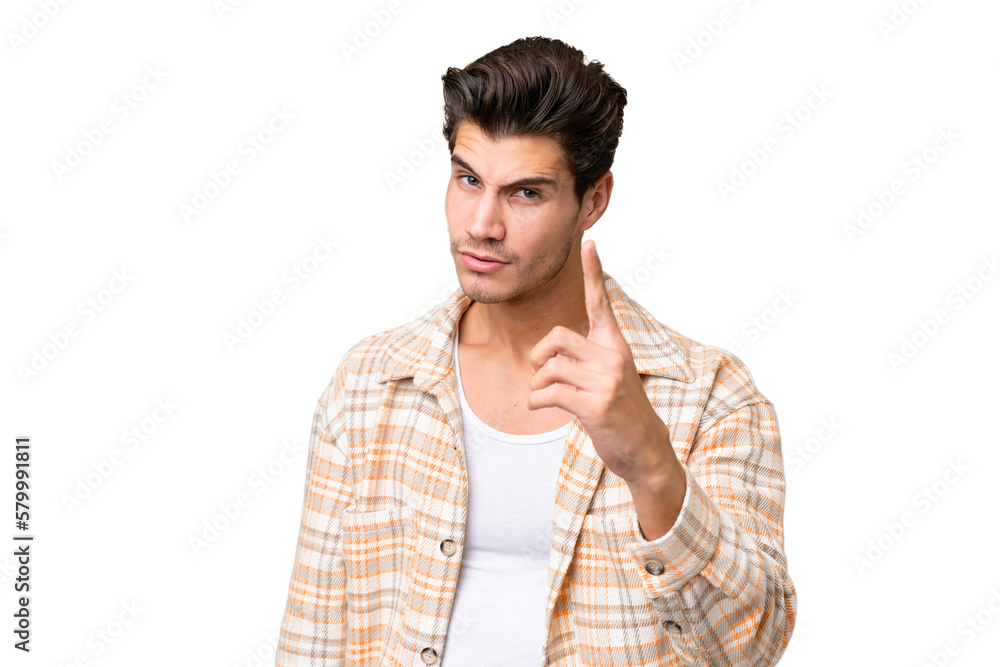 Young handsome caucasian man over isolated background frustrated and pointing to the front Young handsome caucasian man over isolated background frustrated and pointing to the front