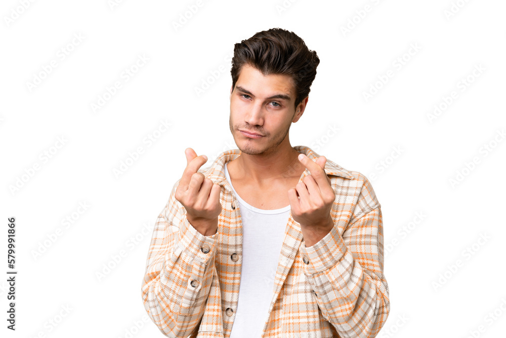 Young handsome caucasian man over isolated background making money gesture but is ruined Young handsome caucasian man over isolated background making money gesture but is ruined