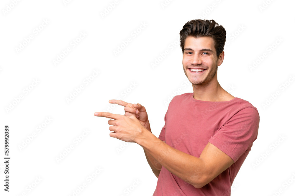 Young handsome caucasian man over isolated background pointing finger to the side and presenting a product Young handsome caucasian man over isolated background pointing finger to the side and presenting a product