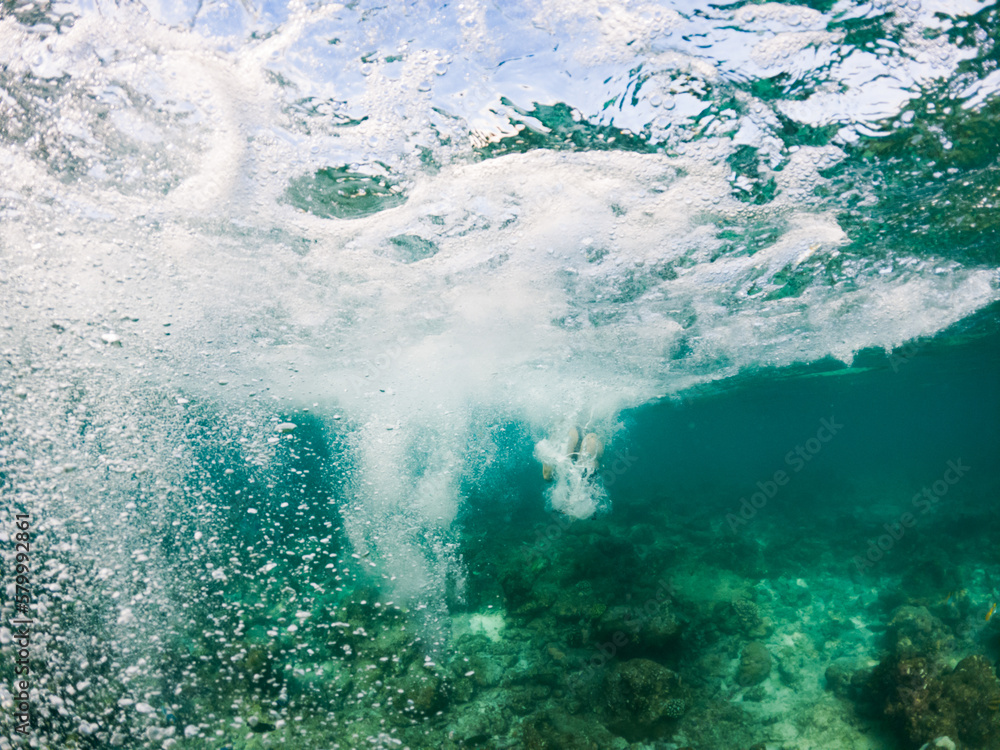 Obraz premium abstract underwater background of clear blue tropical sea