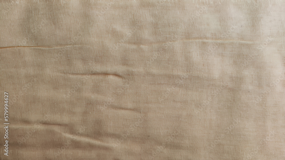 Fototapeta premium Abstract background and texture from yellow linen fabric, made from linen fibers