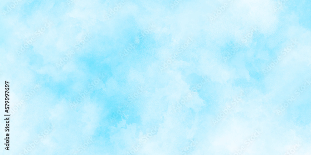 Beautiful and cloudy sky blue watercolor background, blurred and grainy Blue powder explosion on white background, Classic hand painted Blue watercolor background for design.	