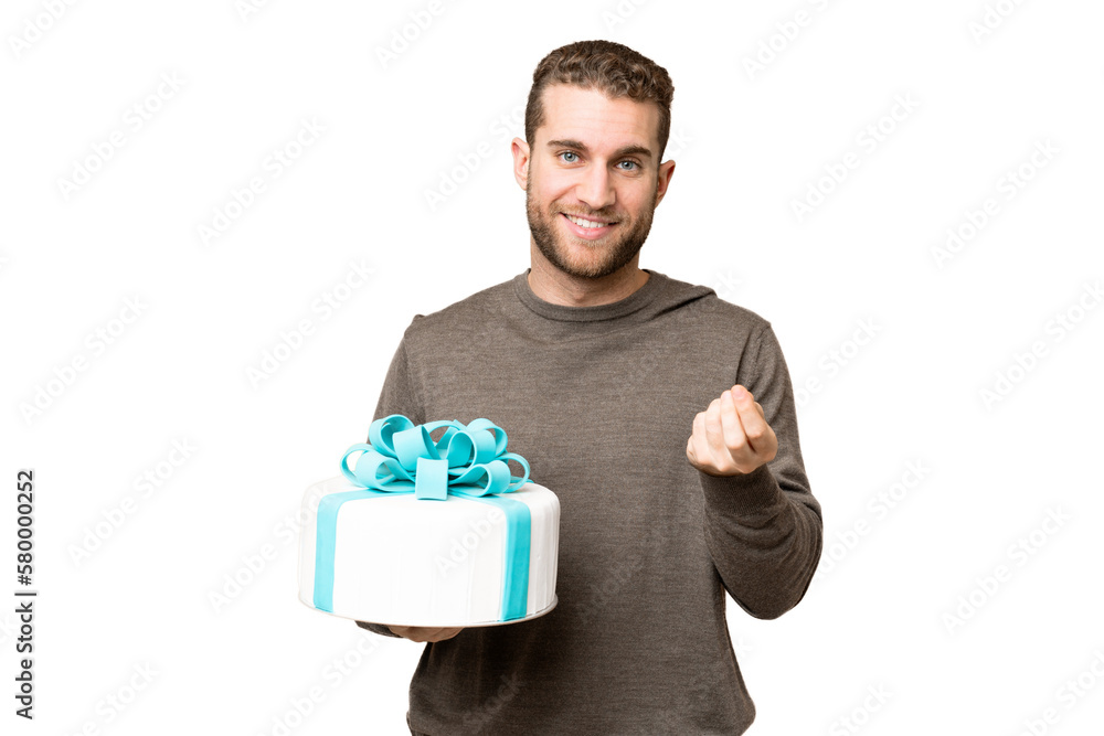 Young handsome blonde man holding birthday cake over isolated chroma key background making money gesture Young handsome blonde man holding birthday cake over isolated chroma key background making money gesture