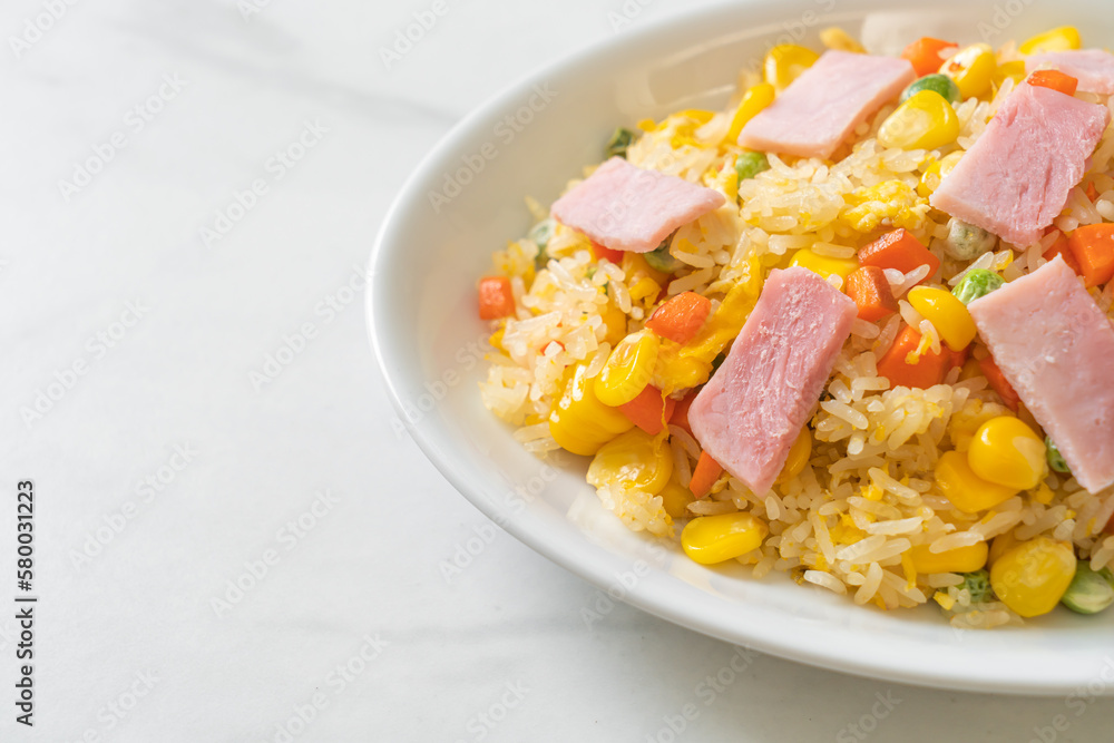 fried rice with ham and mixed vegetable (carrot, green bean peas, carrot) fried rice with ham and mixed vegetable (carrot, green bean peas, carrot)