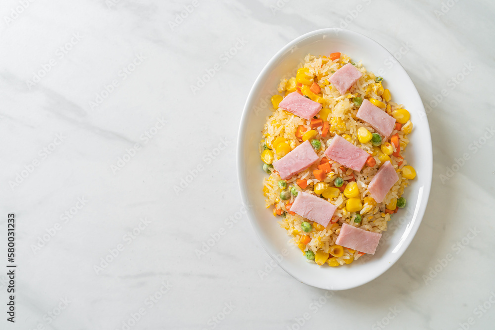 fried rice with ham and mixed vegetable (carrot, green bean peas, carrot) fried rice with ham and mixed vegetable (carrot, green bean peas, carrot)