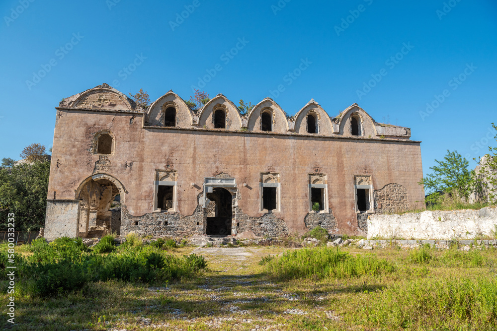 Ruined Taksiyarhis upper church of Kayakoy (Levissi) abandoned village near Fethiye in Mugla province of Turkey.