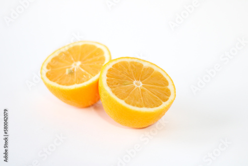 Fresh yellow lemon on a white background.  Close-up photo