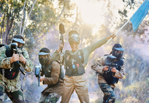 Teamwork, paintball and capture the flag in celebration for winning, victory or achievement standing together in nature. Group of paintballers rally up for win, success or checkpoint with guns ready