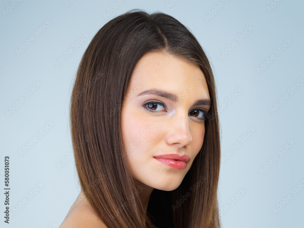 Makeup, beauty and portrait of woman with cosmetics on blue background for wellness, skincare and facial. Salon aesthetic, dermatology and face of girl with spa treatment, hair care and glamour Makeup, beauty and portrait of woman with cosmetics on blue background for wellness, skincare and facial. Salon aesthetic, dermatology and face of girl with spa treatment, hair care and glamour