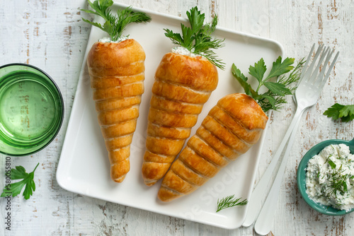 Easter Stuffed Roll Carrots. photo