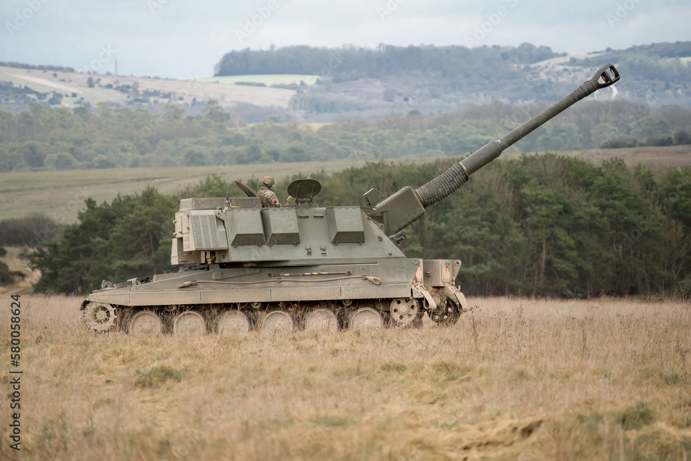 British army military AS90 (AS-90 Braveheart Gun Equipment 155mm L131) armoured self-propelled howitzer, gun aimed skywards on a military exercise, Wilts UK British army military AS90 (AS-90 Braveheart Gun Equipment 155mm L131) armoured self-propelled howitzer, gun aimed skywards on a military exercise, Wilts UK
