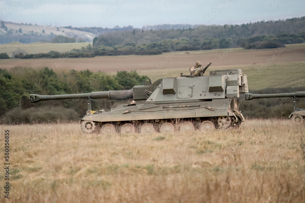 British army military AS90 (AS-90 Braveheart Gun Equipment 155mm L131) armoured self-propelled howitzer on a military exercise, Wilts UK British army military AS90 (AS-90 Braveheart Gun Equipment 155mm L131) armoured self-propelled howitzer on a military exercise, Wilts UK