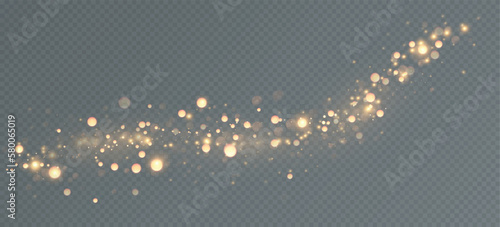 Golden sequins glow with many lights. Glittering dust. Luxurious background of golden particles.