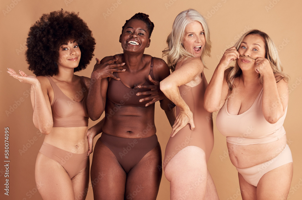 Foto de Lingerie, body positivity and women smile for diversity, self love  and inclusive clothes against a brown studio background. Decision, happy  and crazy portrait of small and plus size underwear model
