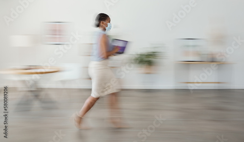Woman, fast walking and mask in office, working or businesswoman in workplace. Corporate employee, covid social distancing and black woman speed walk for workforce or busy agency manager commitment