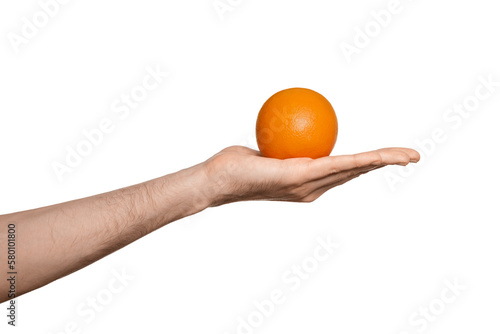 Male hand palm up, orange in the palm, isolate.