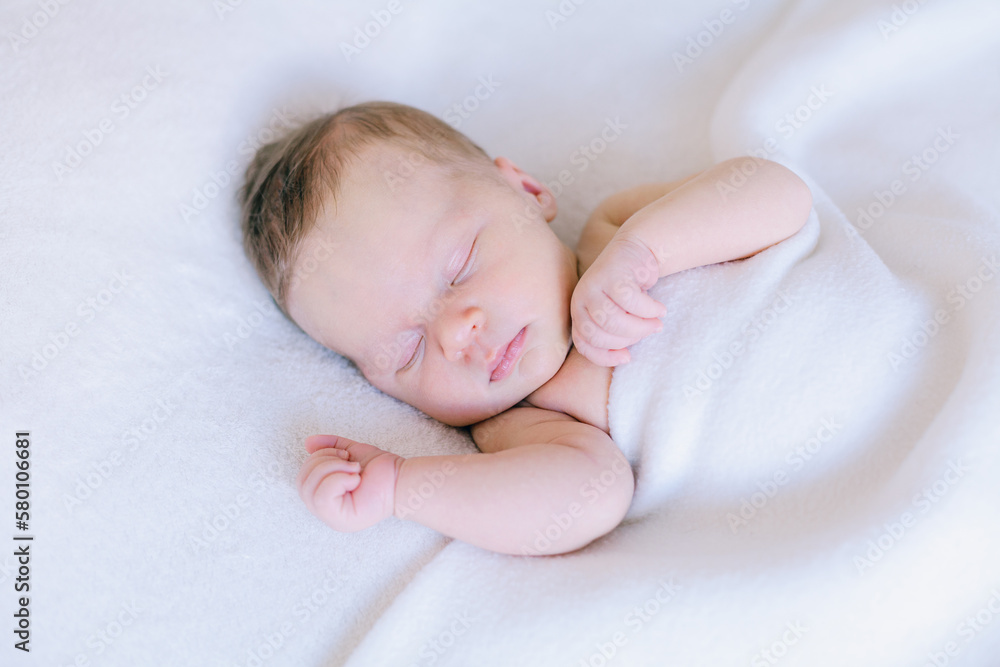 Peaceful sleeping newborn baby two weeks old. Peaceful sleeping newborn baby two weeks old.