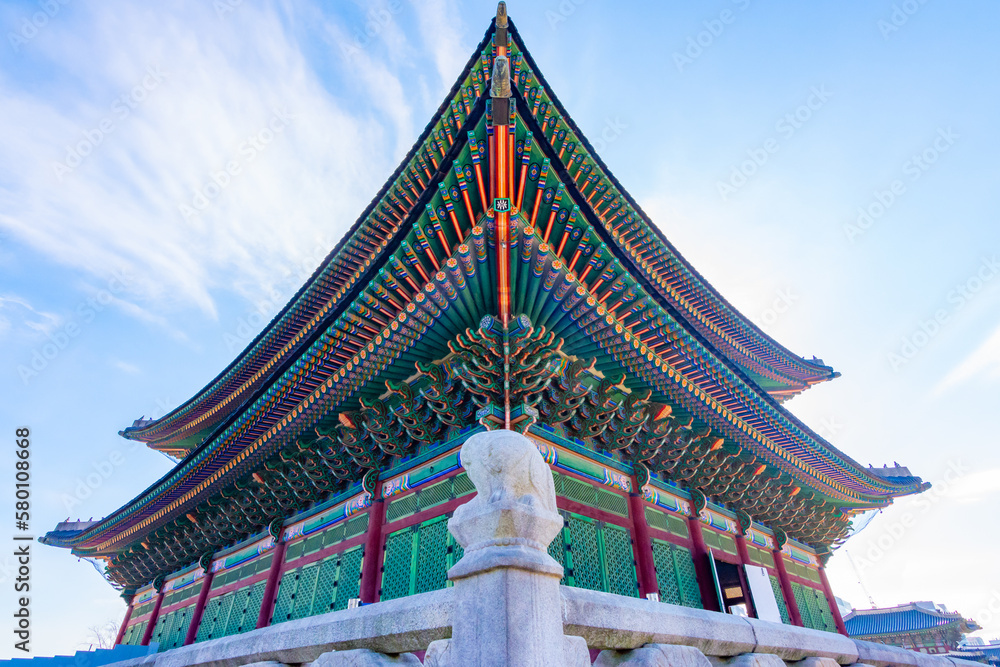 Korean traditional hanok architecture. Beautiful Architecture of Gyeongbokgung Palace with beautiful blue sky background in Seoul, South Korea Korean traditional hanok architecture. Beautiful Architecture of Gyeongbokgung Palace with beautiful blue sky background in Seoul, South Korea