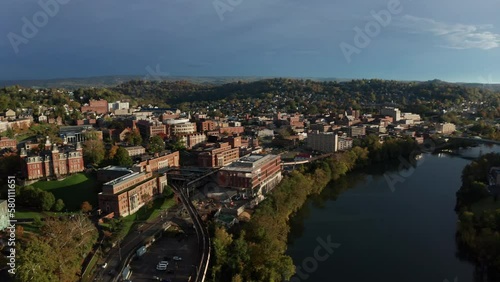 West Virginia University in Morgantown, WV - aerial pan from river to city.