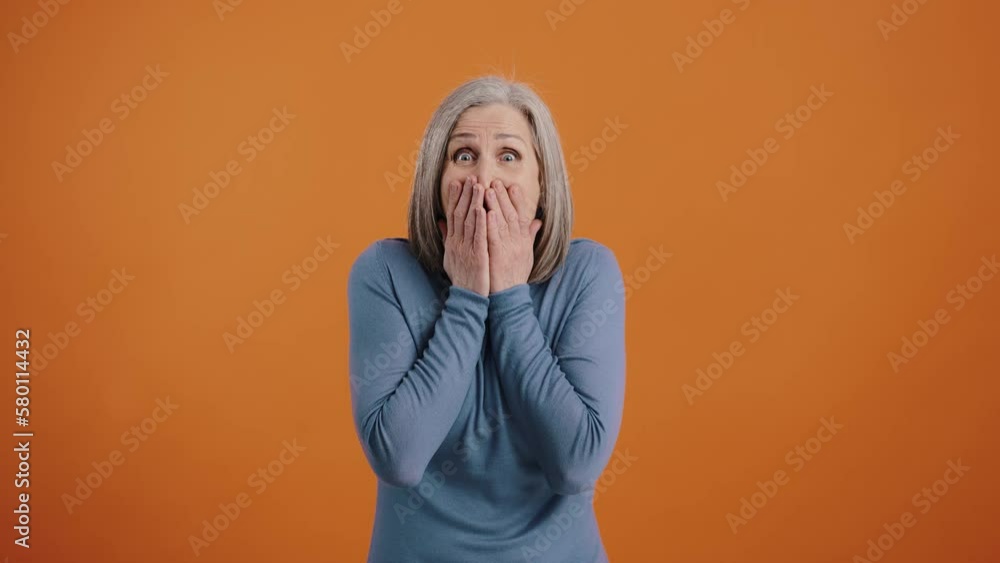 Gambling gray-haired woman rejoices at win excitedly Gambling gray-haired woman rejoices at win excitedly
