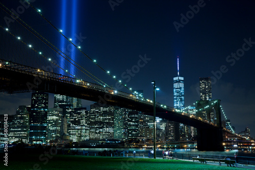 Brooklyn bridge with Tribute in Light . The installation of 88 searchlights has been displayed annually in remembrance of the September 11, 2001 attacks.