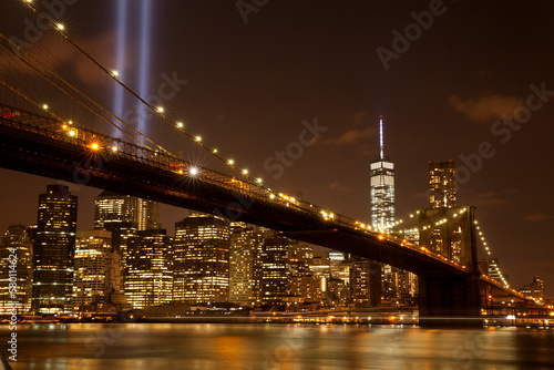 Fototapeta Naklejka Na Ścianę i Meble -  Brooklyn bridge with Tribute in Light . The installation of 88 searchlights has been displayed annually in remembrance of the September 11, 2001 attacks.