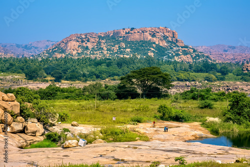 View of Anjaneya hill in Hampi. This place is supposed to be the birthplace of Lord Hanumana. Hampi is a UNESCO World Heritage site. photo