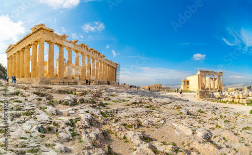 Panoramic view of the ancient Parthenon, Erechtheion, and Propylaea gateway to the ruins of the Acropolis complex on Acropolis Hill in Athens, Greece.