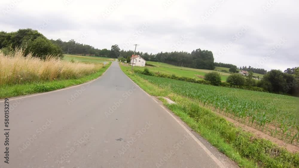 a paved road passing through Rubial hamlet, Lestedo (Santa Maria), municipality of Boqueixon, Corunha province, Spain a paved road passing through Rubial hamlet, Lestedo (Santa Maria), municipality of Boqueixon, Corunha province, Spain