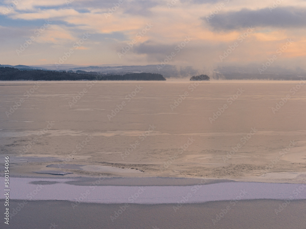 View towards the small island Steinsholmen in Lake Mjøsa, where the ancient ruins of Mjøskastellet is to be found. View towards the small island Steinsholmen in Lake Mjøsa, where the ancient ruins of Mjøskastellet is to be found.