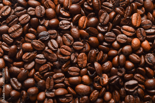 Dark roast coffee beans background  top view