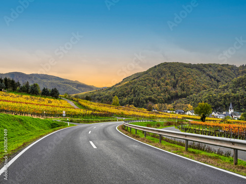 Winding Road through Bruttig-Fankel village and steep vineyards during a beautiful autumn day in Cochem-Zell, Germany