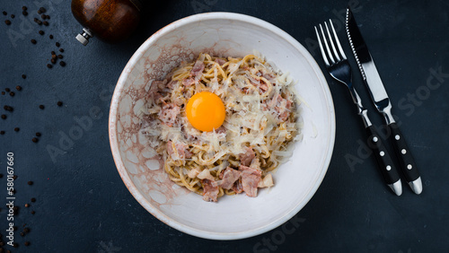 Pasta with ham, parmesan cheese and raw egg.