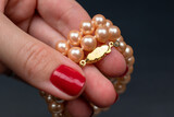 Retro pearl necklace, vintage jewelry concept, promotional photo for an online jewelry store