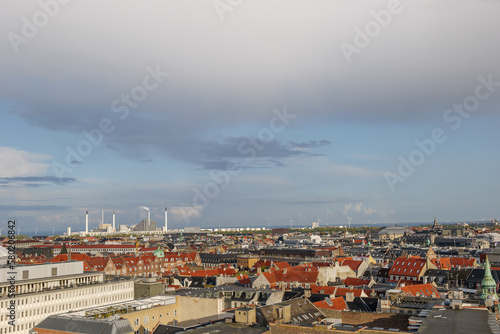 Aerial panoramic outdoor scenery view over Copenhagen  Denmark after raining with background of rainbow. 