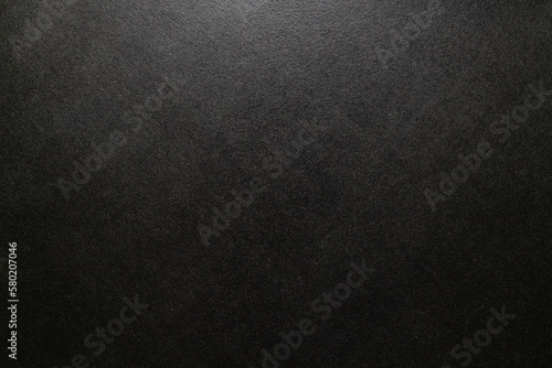 Black wooden background with studio light
