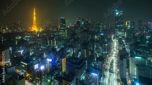 Wallpaper Mural Night time lapse of Tokyo Japan. The Tokyo Tower can be seen in the distance. Torontodigital.ca