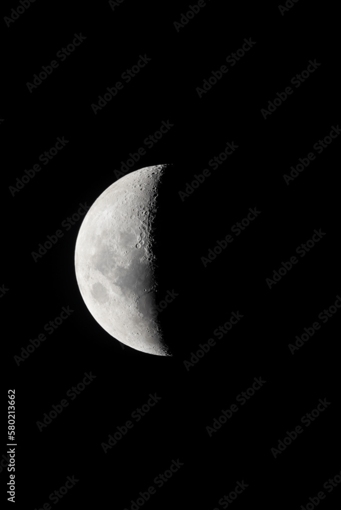 Night sky background with half of the moon on black sky. Astro photo on winter night with soft selective focus Night sky background with half of the moon on black sky. Astro photo on winter night with soft selective focus