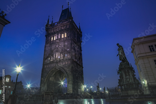 Charles Bridge, Prague at dramatic evening, Czech Republic, with night lighting