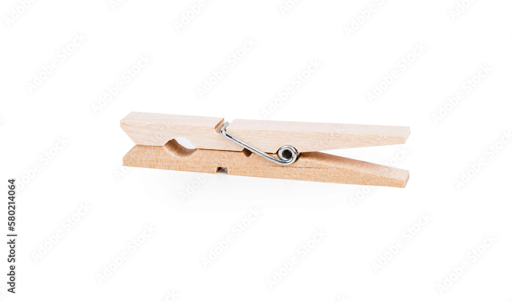 One classic wooden clothespin isolated on white background. One classic wooden clothespin isolated on white background.