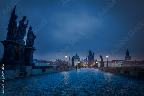 Obraz na płótnie Charles Bridge, Prague at dramatic evening, Czech Republic, with night lighting w salonie