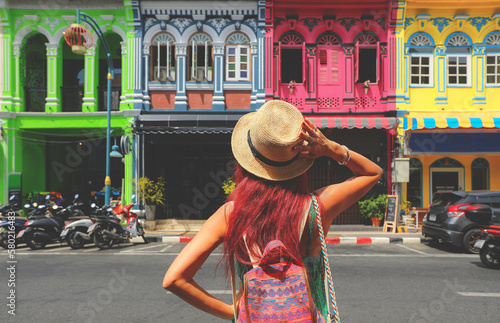 Traveler on street Phuket old town looking at colorful buildings Sino Portuguese architecture in Phuket Old Town. photo