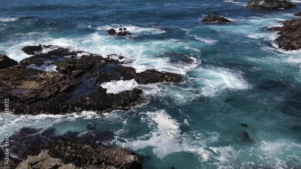 Aerial shot of the rugged coastline along the Pacific Coast Highway in Central California Aerial shot of the rugged coastline along the Pacific Coast Highway in Central California