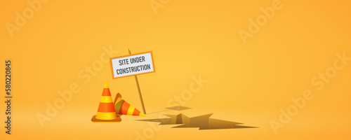 Site under construction yellow red cones and sign  warning photo