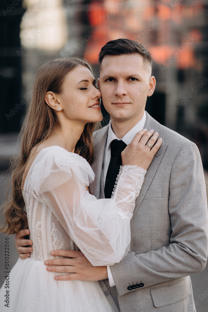 Front view of bride and groom getting married, having photoshoot outdoors Front view of bride and groom getting married, having photoshoot outdoors